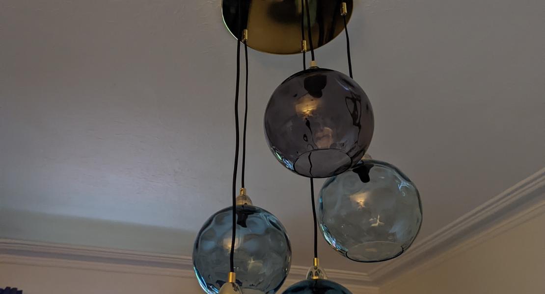 Decorative glass light fitting