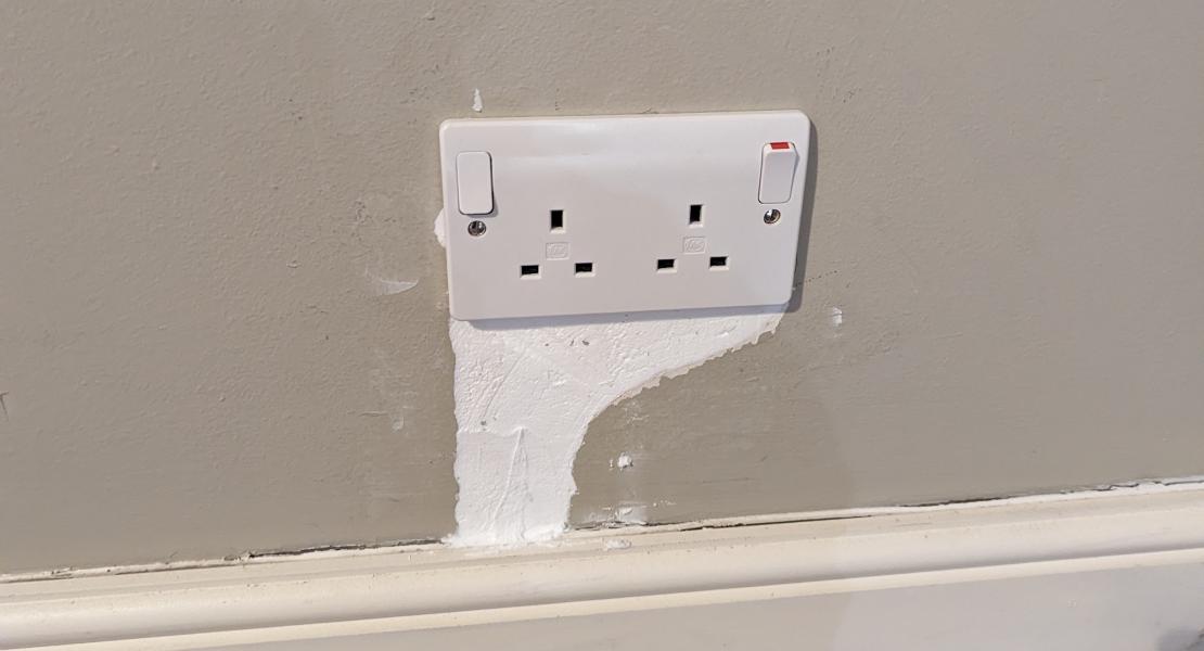 Installed double socket Hole filled