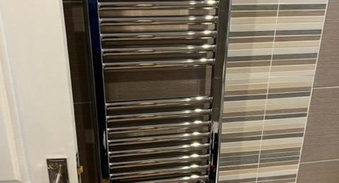 electric towel rail fitting in Bournemouth