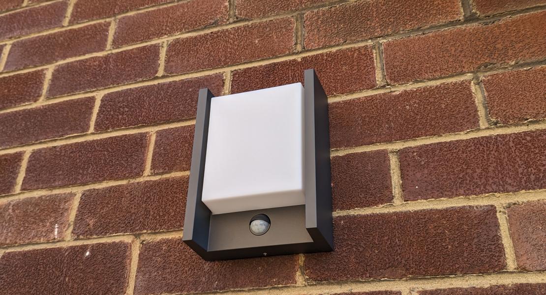 Modern outside bulkhead light with PIR motion sensor