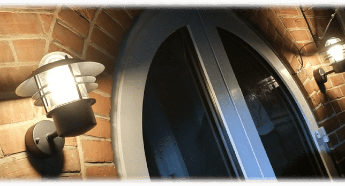 NIC electrician in Rochester installing outside lights installed 