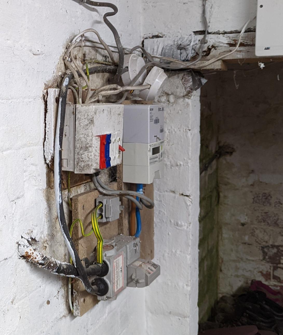 Dangerous Old fuse board in cellar with junction box and old wiring with no RCD protection
